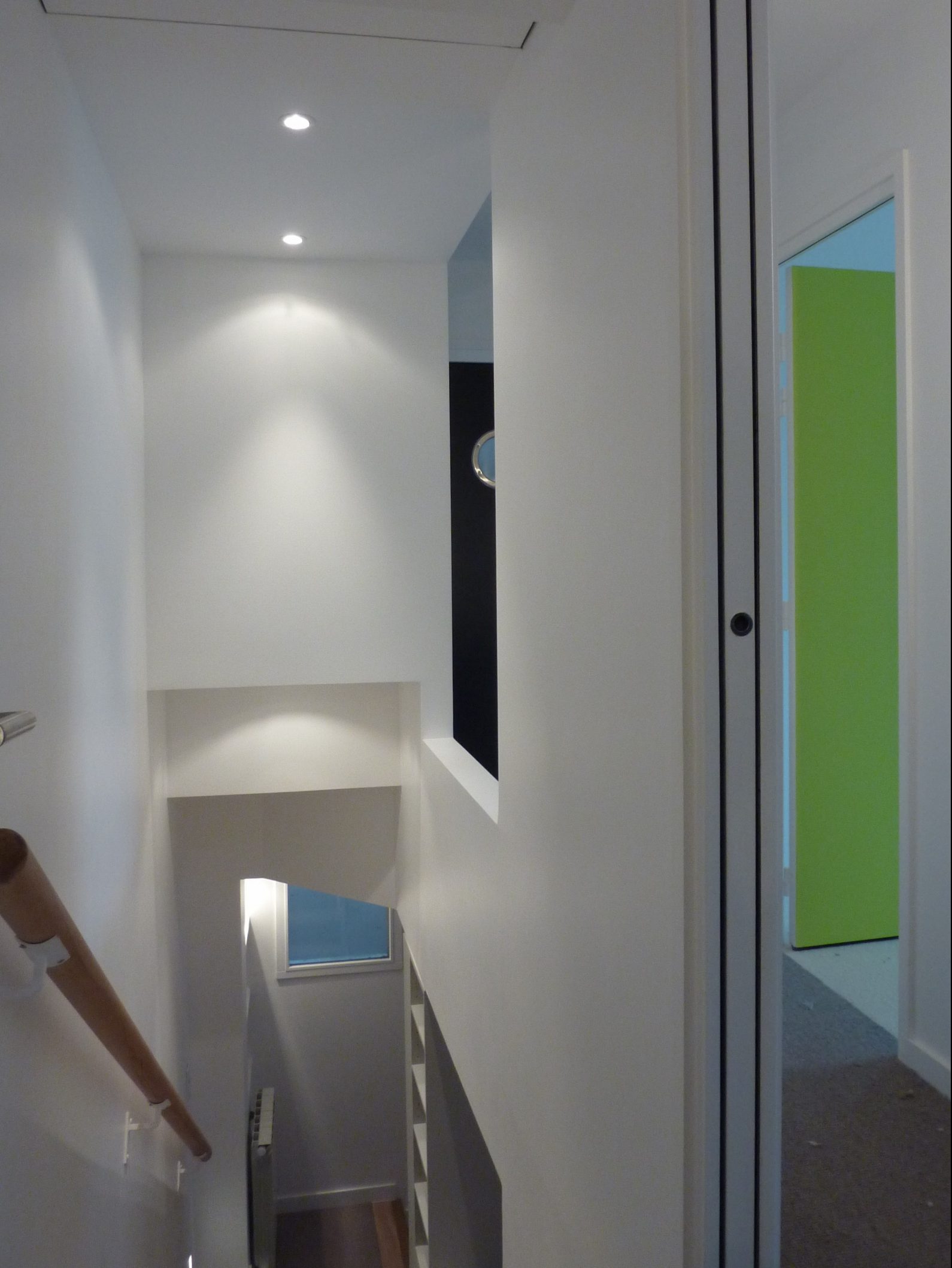 Vue après travaux de l'escalier du duplex, ouverture et vues, mobilier sur-mesure, Paris Jardin des Plantes
